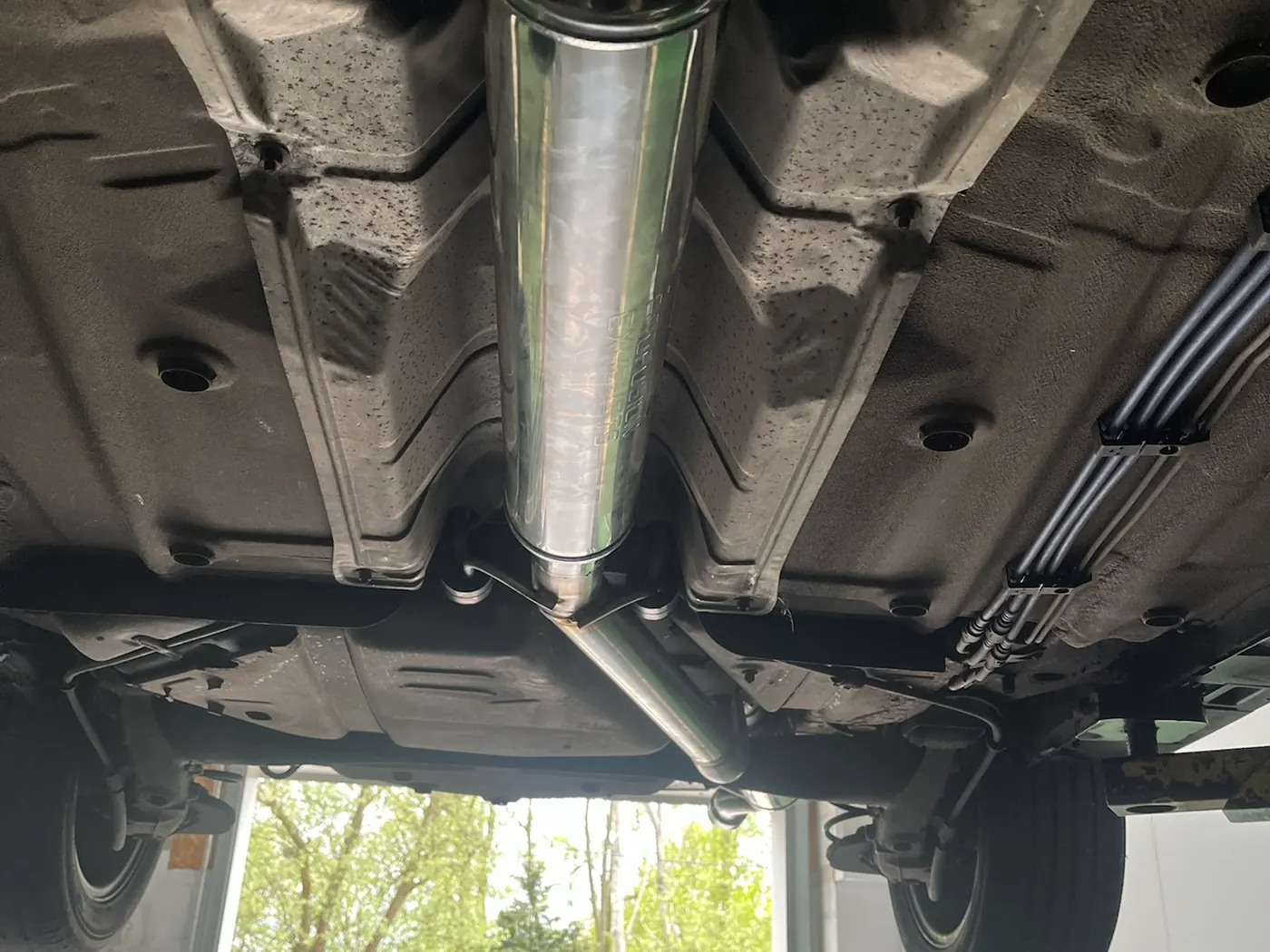 Stainless exhaust system fitted to a car at Goblin Automotive